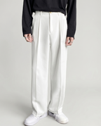 Pantalon homme à plis