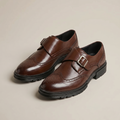Chaussures homme à boucle perforées